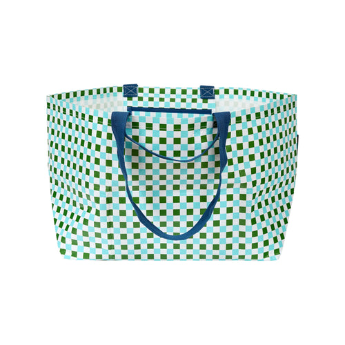 Extra large oversize beach bag made from strong and light recycled materials that can fold down to store and comes in a fun and bright print