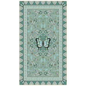 Beach towel that is sand free, lightweight, absorbent, fast drying and made from 85% recycled plastic bottles in butterfly paisley teal print