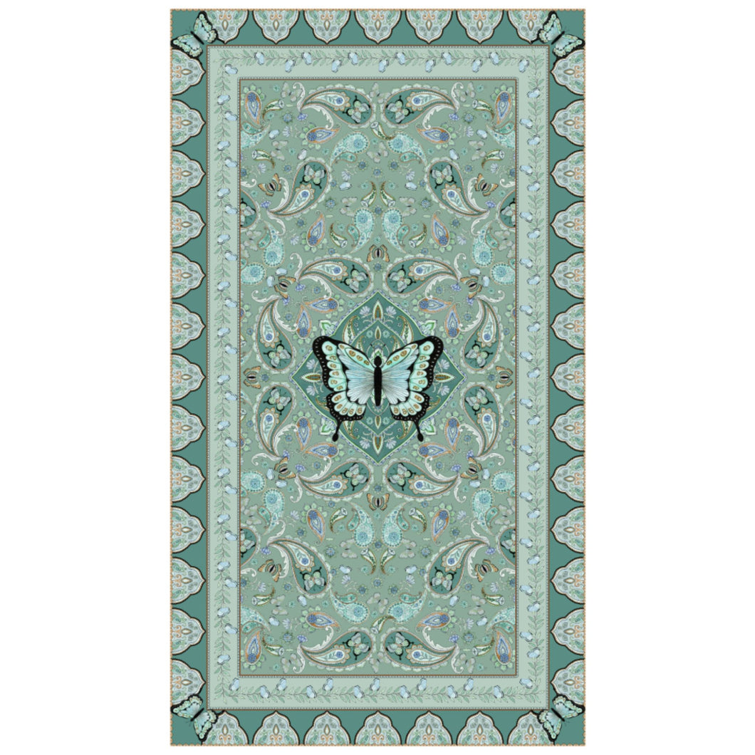 Beach towel that is sand free, lightweight, absorbent, fast drying and made from 85% recycled plastic bottles in butterfly paisley teal print