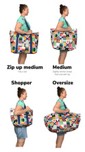 Load image into Gallery viewer, Extra large oversize beach bag made from strong and light recycled materials that can fold down to store and comes in a fun and bright print
